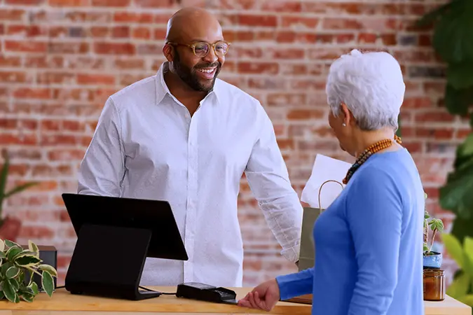 Business owner with customer